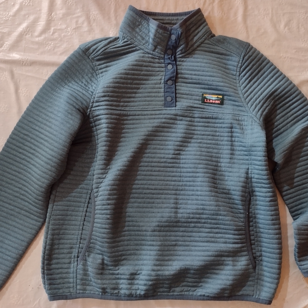 pale blue, quarter button pullover.